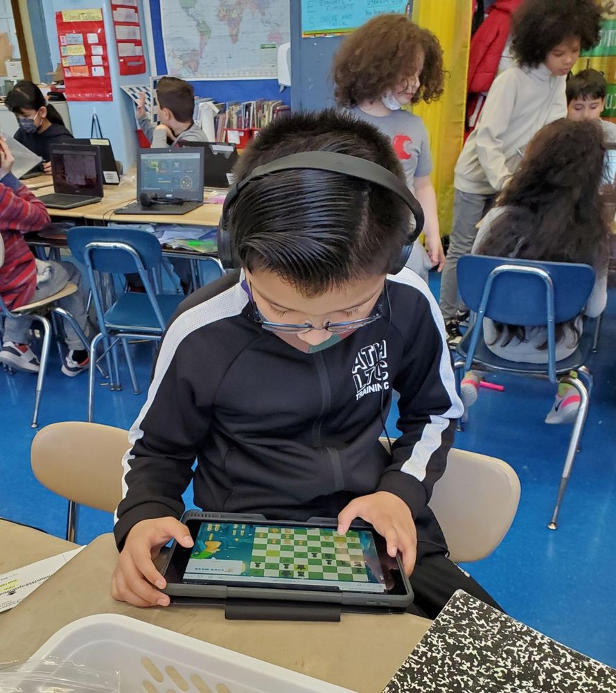 Students playing chess at PS 88Q (photo 1 of 3)