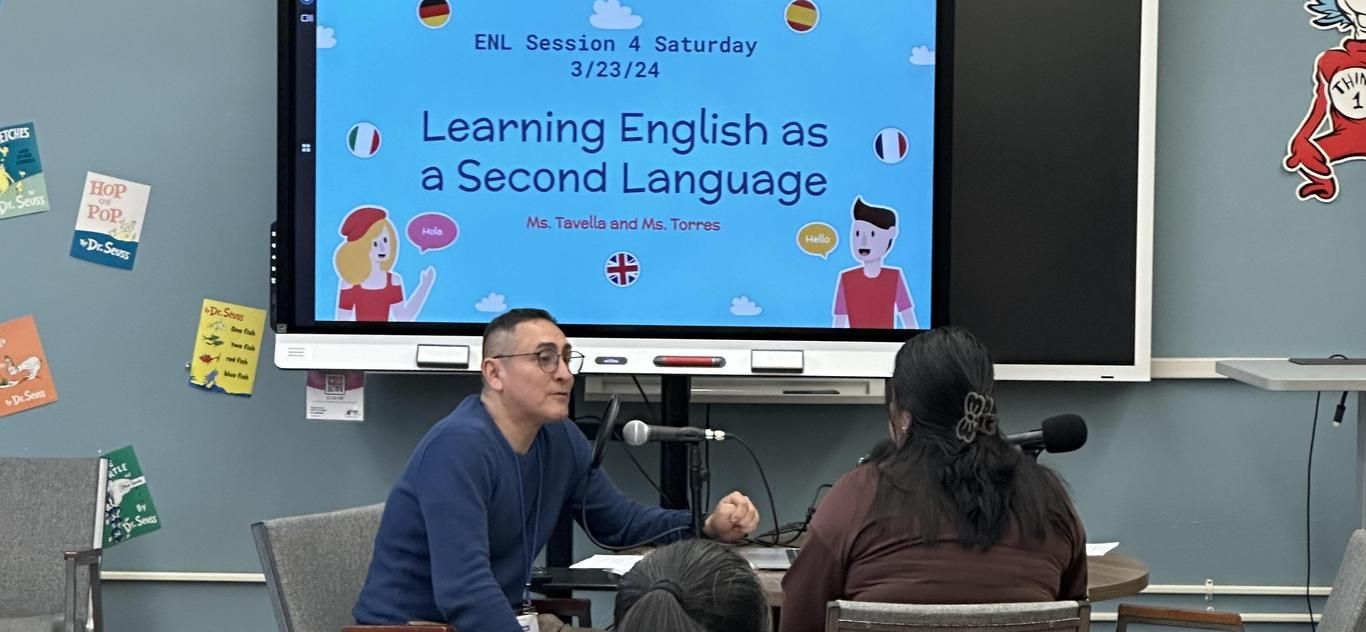 Families at a Parent Academy session learning English as a Second Language